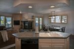 Prepare memorable meals in the fully-equipped kitchen - and even catch views of Whitefish Lake while you cook